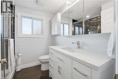 Bathroom featuring a marble finish shower and vanity - 668 Tomahawk Crescent, Ancaster, ON - Indoor Photo Showing Bathroom