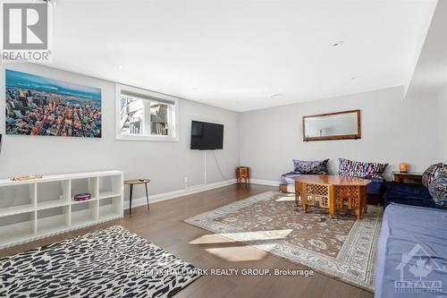 Large windows and tons of extra living space. - 250 Richardson Avenue, Ottawa, ON - Indoor Photo Showing Living Room