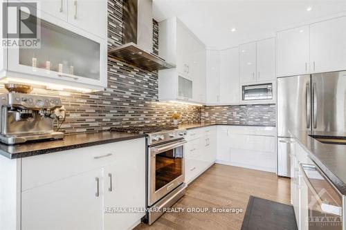 Gorgeous tile back splash. - 250 Richardson Avenue, Ottawa, ON - Indoor Photo Showing Kitchen With Upgraded Kitchen