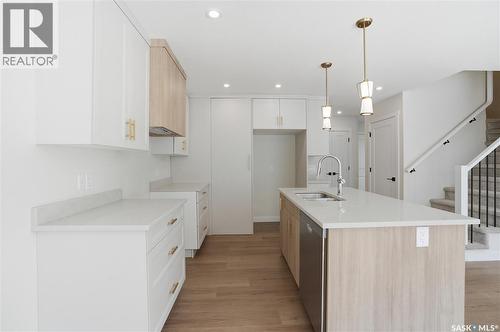 404 155 Mcfaull Way, Saskatoon, SK - Indoor Photo Showing Kitchen With Upgraded Kitchen