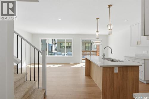 404 155 Mcfaull Way, Saskatoon, SK - Indoor Photo Showing Kitchen With Double Sink