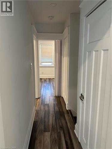 Hall with dark hardwood / wood-style floors - 1090 Cannon Street E, Hamilton, ON - Indoor Photo Showing Other Room