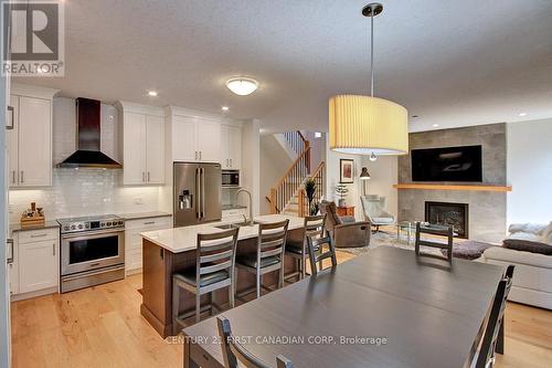 2113 Linkway Boulevard, London South (South A), ON - Indoor Photo Showing Kitchen With Fireplace With Upgraded Kitchen