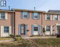 Colonial house featuring brick siding and a front lawn - 27 Queenston Drive, Kitchener, ON  - Outdoor 