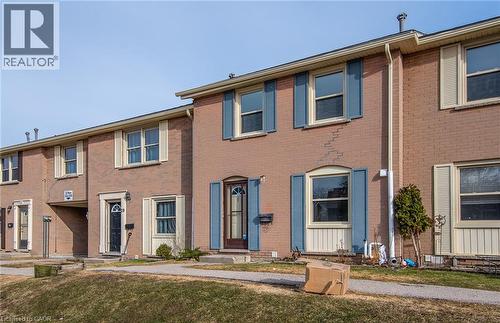 Colonial inspired home featuring brick siding - 27 Queenston Drive, Kitchener, ON - Outdoor