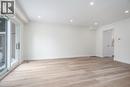 Empty room with light wood-type flooring and recessed lighting - 27 Queenston Drive, Kitchener, ON  - Indoor Photo Showing Other Room 