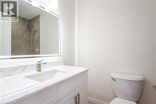 Full bath featuring vanity and a tile shower - 27 Queenston Drive, Kitchener, ON - Indoor Photo Showing Bathroom