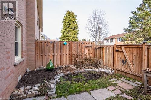 Fenced backyard featuring a gate - 27 Queenston Drive, Kitchener, ON - Outdoor