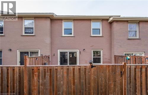 Back of house featuring brick siding - 27 Queenston Drive, Kitchener, ON - Outdoor With Exterior