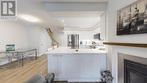 419 - 1400 The Esplanade North W, Pickering, ON - Indoor Photo Showing Other Room With Fireplace