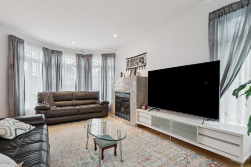 Salon - 263 Rue Des Échevins, Saint-Jean-Sur-Richelieu, QC - Indoor Photo Showing Living Room With Fireplace