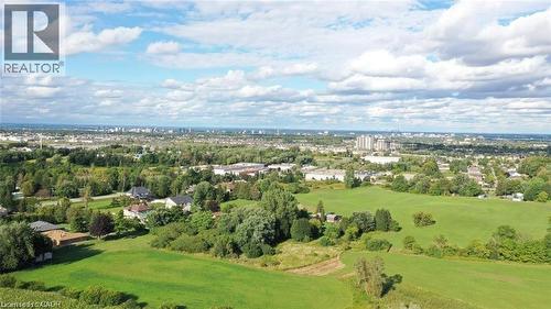 Aerial view of a tree filled landscape - 2265 Snyder'S Road E, Kitchener, ON - Outdoor With View