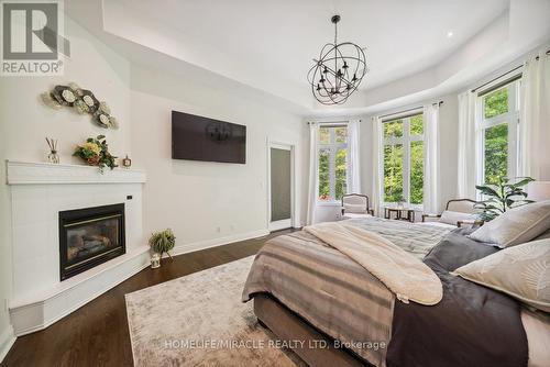 12 Deer Run, Uxbridge, ON - Indoor Photo Showing Bedroom With Fireplace
