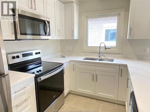 233 Watson Unit# 305, Windsor, ON - Indoor Photo Showing Kitchen With Double Sink