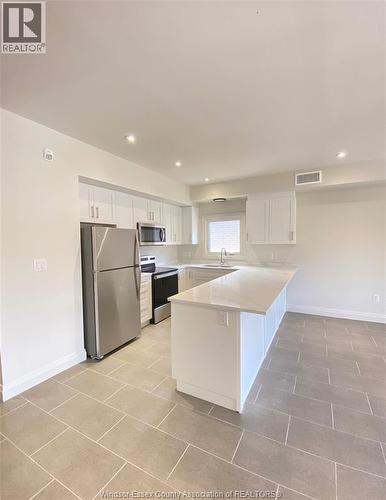 233 Watson Unit# 305, Windsor, ON - Indoor Photo Showing Kitchen