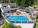 1896 3A Highway, Nelson, BC  - Outdoor With Above Ground Pool With Deck Patio Veranda With Exterior 