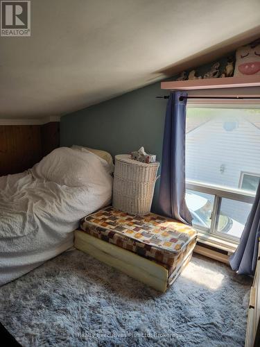 Second Bedroom - 48 Tiny Beaches Road N, Tiny, ON - Indoor Photo Showing Bedroom