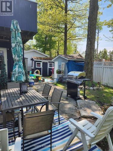 Patio & Rear Yard - 48 Tiny Beaches Road N, Tiny, ON - Outdoor With Deck Patio Veranda