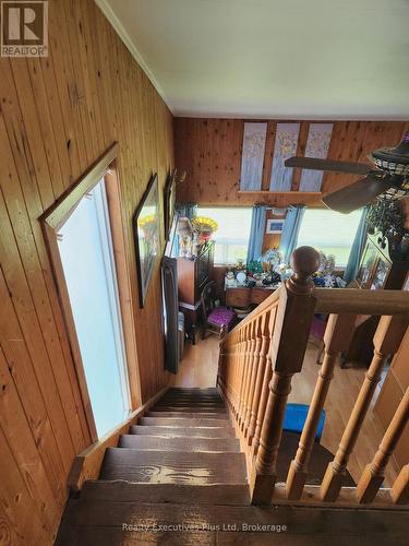 Stairs from Main to Upper Levels - 48 Tiny Beaches Road N, Tiny, ON - Indoor Photo Showing Other Room