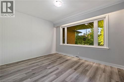 Unfurnished room featuring wood finished floors - 40 Bertram Drive, Dundas, ON - Indoor Photo Showing Other Room