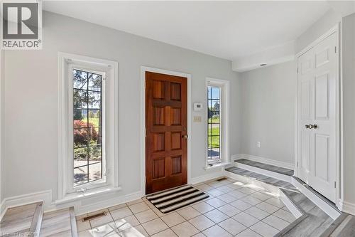 Foyer featuring light tile patterned flooring and plenty of natural light - 40 Bertram Drive, Dundas, ON - Indoor Photo Showing Other Room