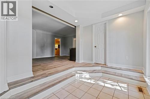 Unfurnished room with light tile patterned floors and recessed lighting - 40 Bertram Drive, Dundas, ON - Indoor Photo Showing Other Room