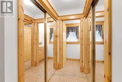 Mudroom has two walls of closets - 
