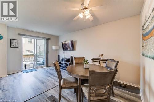 Newer flooring on carpet-free main level. - 90 Mooregate Crescent Unit# 27, Kitchener, ON 