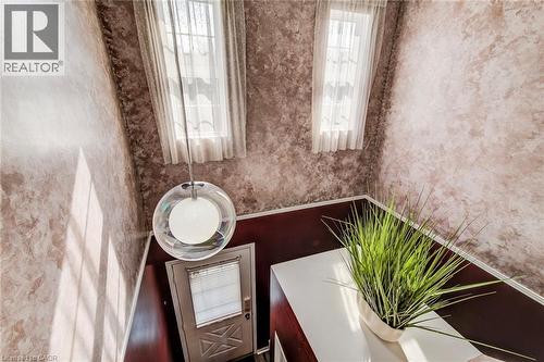 Foyer below, with overhead area for natural light. - 90 Mooregate Crescent Unit# 27, Kitchener, ON 