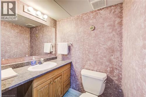 2-piece powder room off the Rec Room. - 90 Mooregate Crescent Unit# 27, Kitchener, ON 
