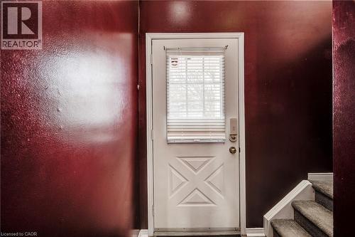 Double-height foyer brings in natural light. - 90 Mooregate Crescent Unit# 27, Kitchener, ON 