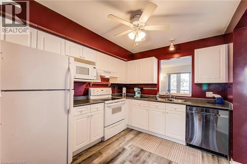 Kitchen cabinet doors recently refreshed. - 90 Mooregate Crescent Unit# 27, Kitchener, ON 