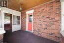 Front doors to enclosed porch/sunroom and front foyer - 33 Main Street E, Drayton, ON  - Outdoor With Exterior 