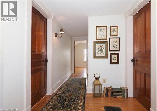 Virtual staging of upstairs hallway to bedrooms - 33 Main Street E, Drayton, ON - Indoor Photo Showing Other Room