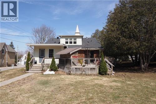 Back view of property with wooden deck - 33 Main Street E, Drayton, ON - Outdoor With Deck Patio Veranda