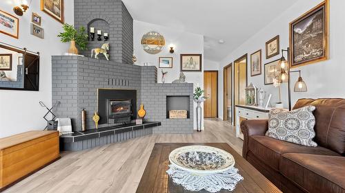 940 Peterman Road, Creston, BC - Indoor Photo Showing Living Room With Fireplace