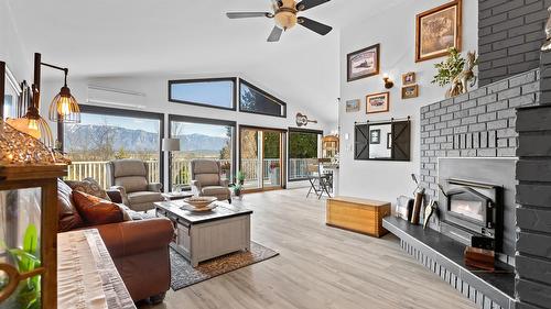 940 Peterman Road, Creston, BC - Indoor Photo Showing Living Room With Fireplace