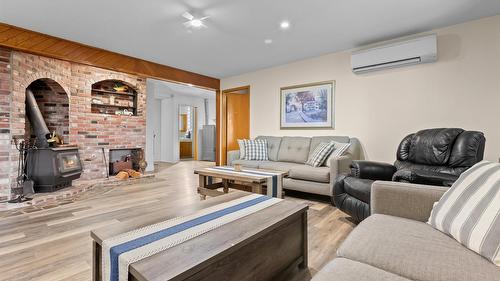 940 Peterman Road, Creston, BC - Indoor Photo Showing Living Room With Fireplace