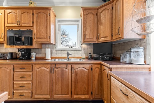 Cuisine - 13 Rue André, Les Coteaux, QC - Indoor Photo Showing Kitchen With Double Sink