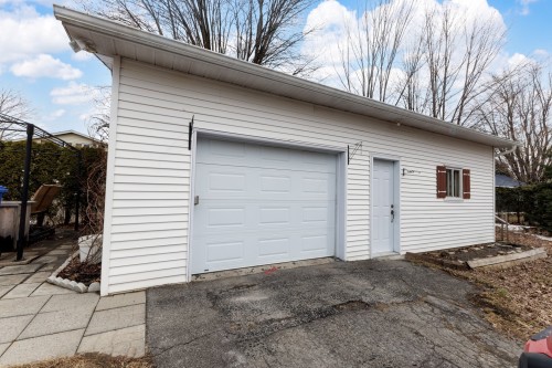 Garage - 13 Rue André, Les Coteaux, QC - Outdoor With Exterior