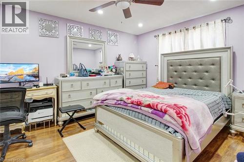 Bedroom featuring a desk, light wood finished floors, a ceiling fan, and recessed lighting - 823 Queensdale Avenue E, Hamilton, ON - Indoor Photo Showing Bedroom