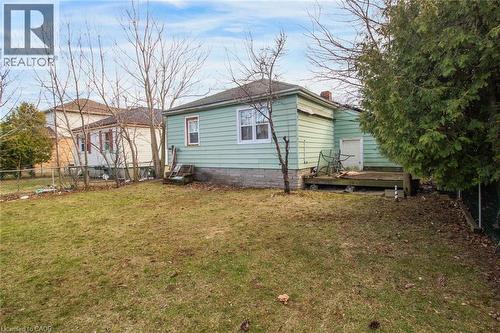 Rear view of house featuring a deck - 823 Queensdale Avenue E, Hamilton, ON - Outdoor