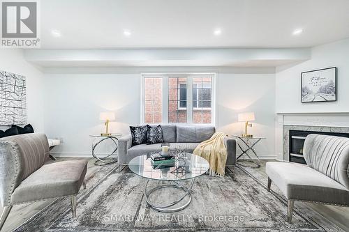 36 Native Landing, Brampton, ON - Indoor Photo Showing Living Room With Fireplace