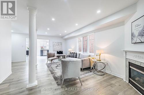 36 Native Landing, Brampton, ON - Indoor Photo Showing Living Room With Fireplace