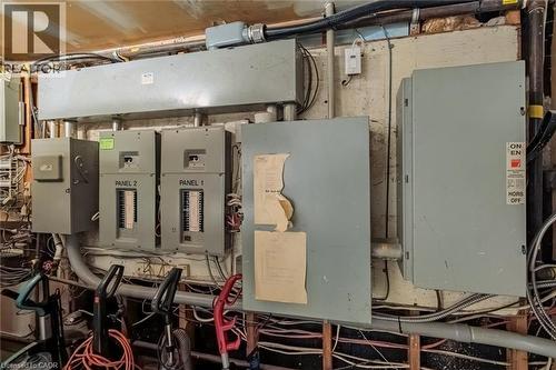 Utility room featuring electric panel - 30 John Street, Port Dover, ON 