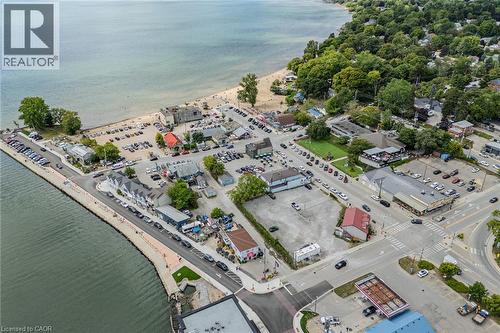 Aerial overview of property's location featuring a nearby body of water - 30 John Street, Port Dover, ON 