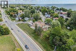 Aerial view of residential area with a large body of water - 