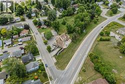 Aerial view of property and surrounding area with nearby suburban area - 