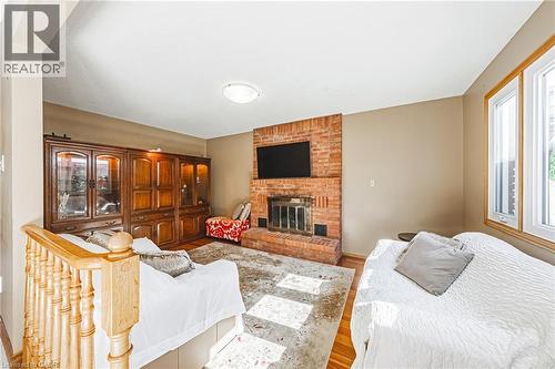19 Glenhaven Court, Hamilton, ON - Indoor Photo Showing Bedroom With Fireplace