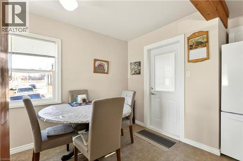 Dining room with plenty of natural light and light tile patterned flooring - 944 Garth Street, Hamilton, ON - Indoor Photo Showing Dining Room